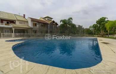 Imagem: A casa em condomínio possui 4 Dormitórios, 2 Banheiros, 5