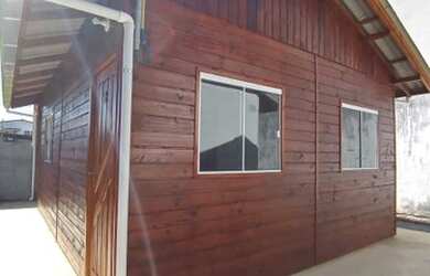 Imagem: A casa possui 2 Dormitórios, 1 Banheiro, 1 Vaga na garagem