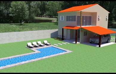 Imagem: A casa possui 2 Dormitórios, 1 Banheiro, 2 Vagas na garagem