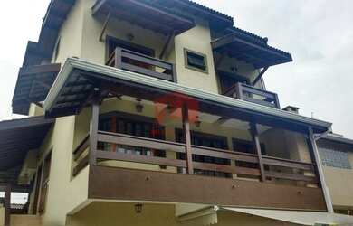 Imagem: A casa possui 4 Dormitórios, 1 Banheiro, 400m² de Área e