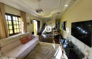 Imagem: A casa possui 3 Dormitórios, 4 Banheiros, 3 Vagas na garagem