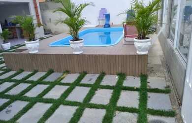 Imagem: A casa possui 3 Dormitórios, 3 Vagas na garagem e está localizado