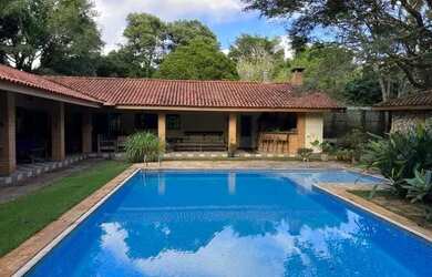 Imagem: A casa em condomínio à venda possui 4 Dormitórios, 5 Banheiros