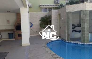 Imagem: A casa em condomínio possui 5 Dormitórios, 5 Banheiros, 2