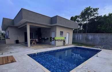 Imagem: A casa possui 3 Dormitórios, 4 Banheiros, 2 Vagas na garagem