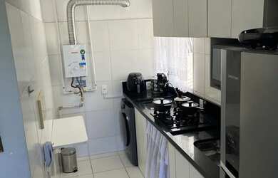 Imagem: O apartamento possui 2 Dormitórios, 1 Banheiro, 2 Vagas na