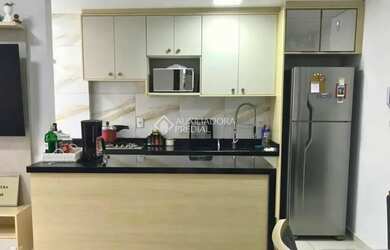 Imagem: O apartamento possui 2 Dormitórios, 1 Banheiro, 1 Vaga na garagem