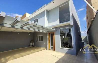 Imagem: A casa possui 3 Dormitórios, 4 Banheiros, 4 Vagas na garagem