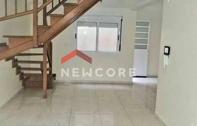 Imagem: A casa possui 3 Dormitórios, 2 Banheiros, 2 Vagas na garagem