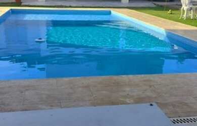 Imagem: A casa possui 5 Dormitórios, 5 Banheiros, 5 Vagas na garagem