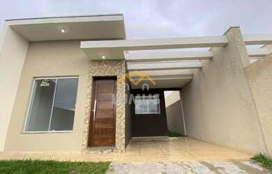 Imagem: A casa possui 3 Dormitórios, 2 Banheiros, 2 Vagas na garagem