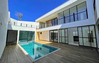 Imagem: A casa em condomínio possui 4 Dormitórios, 5 Banheiros, 5