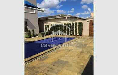 Imagem: A casa possui 5 Dormitórios, 5 Banheiros, 4 Vagas na garagem