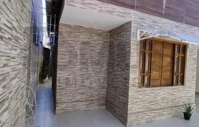 Imagem: A casa possui 3 Dormitórios, 3 Banheiros, 3 Vagas na garagem