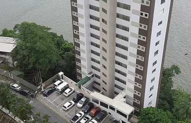 Imagem 7: Paraíso na Ilha Porchat. Vista para o mar, Guarda roupa, 55m² de Áreae2...