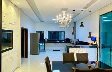 Imagem: A casa possui 3 Dormitórios, 5 Banheiros, 5 Vagas na garagem