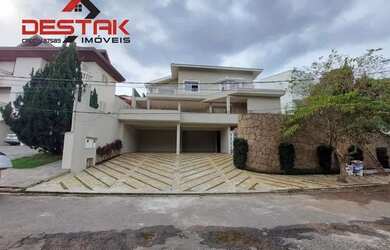 Imagem: A casa em condomínio possui 4 Dormitórios, 5 Banheiros, 4