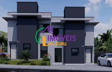 Imagem: A casa possui 2 Dormitórios, 3 Banheiros, 2 Vagas na garagem