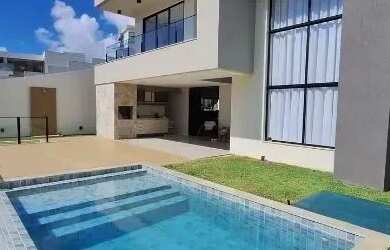 Imagem: A casa em condomínio possui 4 Dormitórios, 5 Banheiros, 2