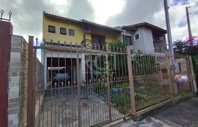 Imagem: A casa possui 3 Dormitórios, 4 Banheiros, 3 Vagas na garagem