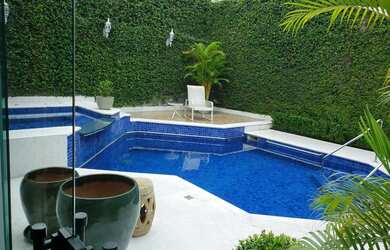 Imagem: A casa em condomínio possui 5 Dormitórios, 5 Banheiros, 5