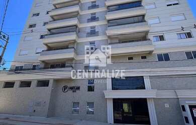 Imagem: O apartamento possui 2 Dormitórios, 1 Banheiro, 2 Vagas na