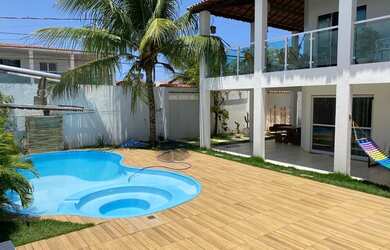 Imagem: A casa possui 5 Dormitórios, 5 Banheiros, 4 Vagas na garagem