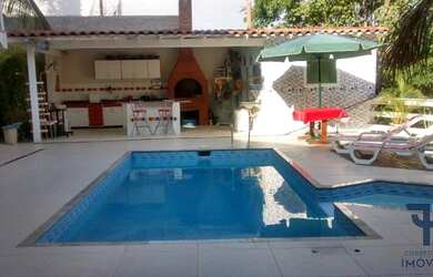 Imagem: A casa em condomínio possui 5 Dormitórios, 5 Banheiros, 2