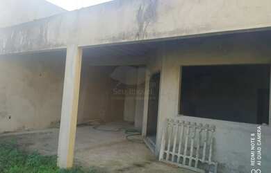 Imagem: A casa possui 2 Dormitórios, 1 Banheiro, 2 Vagas na garagem