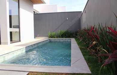 Imagem: A casa em condomínio possui 4 Dormitórios, 5 Banheiros, 2