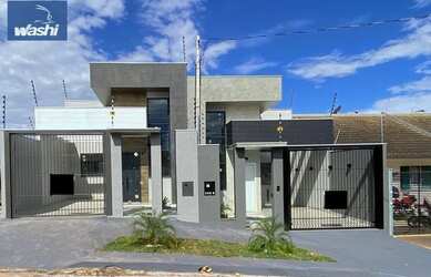 Imagem: A casa possui 3 Dormitórios, 2 Banheiros, 2 Vagas na garagem