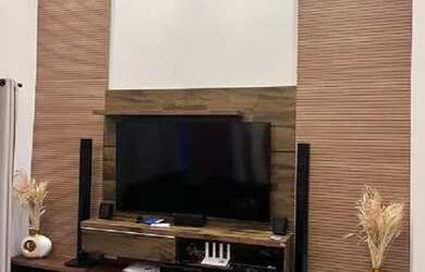 Imagem: A casa possui 3 Dormitórios, 2 Banheiros, 2 Vagas na garagem