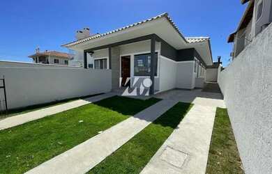 Imagem: A casa possui 3 Dormitórios, 2 Banheiros, 2 Vagas na garagem