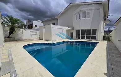 Imagem: A casa em condomínio possui 4 Dormitórios, 4 Banheiros, 4