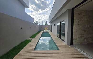 Imagem: A casa possui 4 Dormitórios, 4 Banheiros, 2 Vagas na garagem