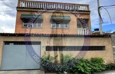 Imagem: A casa possui 2 Dormitórios, 1 Banheiro, 1 Vaga na garagem