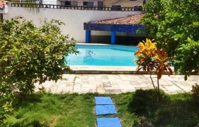 Imagem: A casa possui 3 Dormitórios, 5 Vagas na garagem e está localizado