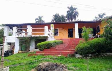 Imagem: A casa possui 5 Dormitórios, 5 Banheiros, 5 Vagas na garagem