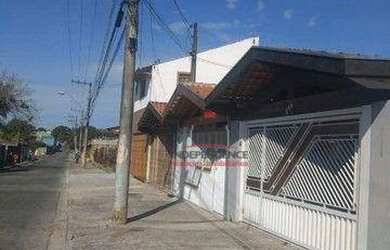 Imagem: A casa possui 3 Dormitórios, 2 Banheiros, 2 Vagas na garagem