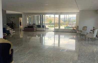 Imagem: A casa em condomínio possui 5 Dormitórios, 5 Banheiros, 4