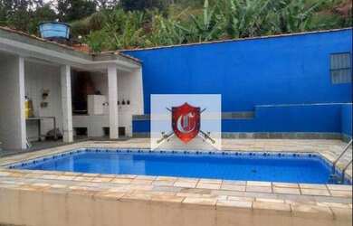 Imagem: A casa possui 2 Dormitórios, 3 Banheiros, 3 Vagas na garagem