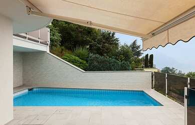 Imagem: A casa possui 2 Dormitórios, 2 Banheiros, 2 Vagas na garagem