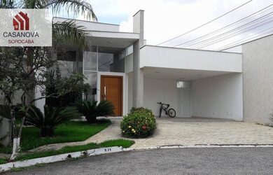 Imagem: A casa possui 3 Dormitórios, 5 Banheiros, 4 Vagas na garagem