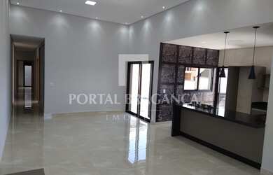 Imagem: A casa possui 3 Dormitórios, 5 Banheiros, 2 Vagas na garagem