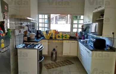 Imagem: A casa possui 3 Dormitórios, 4 Banheiros, 4 Vagas na garagem