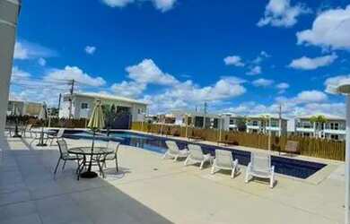 Imagem: A casa em condomínio e possui 2 Dormitórios, Suítes, 2 Banheiros