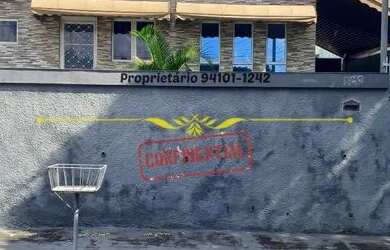 Imagem: A casa possui 3 Dormitórios, 2 Banheiros, 3 Vagas na garagem