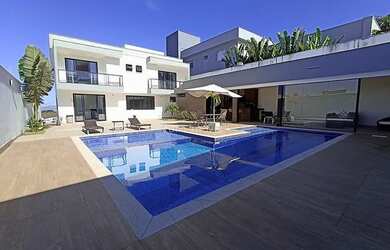 Imagem: A casa em condomínio possui 5 Dormitórios, 4 Banheiros, 5