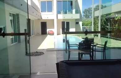 Imagem: A casa em condomínio possui 5 Dormitórios, 5 Banheiros, 3