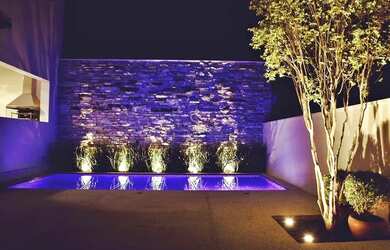 Imagem: A casa possui 5 Dormitórios, 3 Banheiros, 4 Vagas na garagem